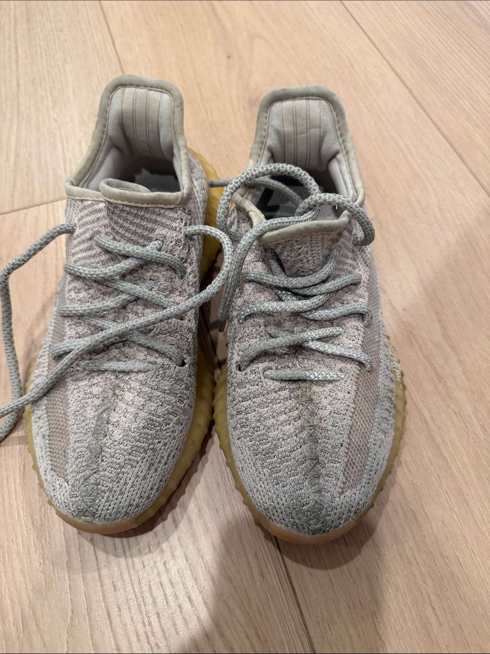 Yeezys Neutral Gray Knit Sneakers with Gum Sole